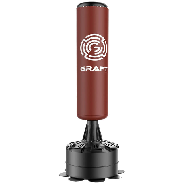 A red and black freestanding boxing punch bag with a black base, featuring the 'GRAFT' brand logo.