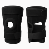 Pair of black knee braces on a white background